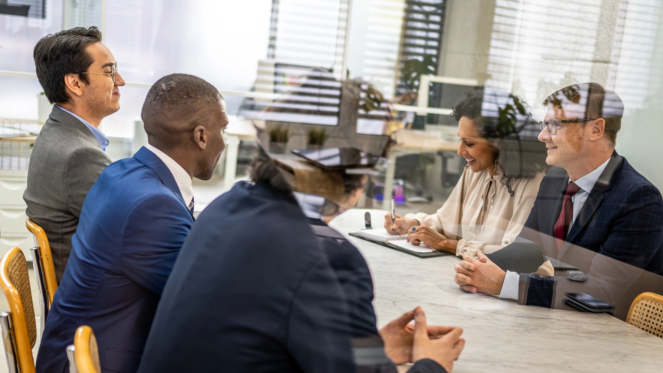 Business partners meeting in a modern office conference room