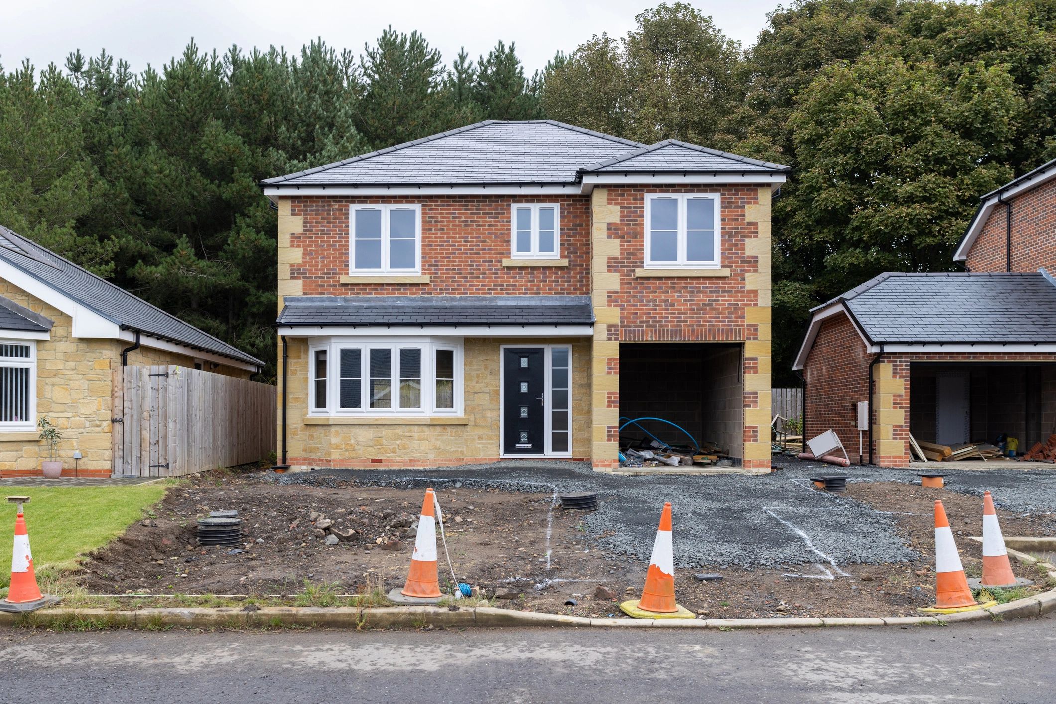 New house under construction on a residential development site