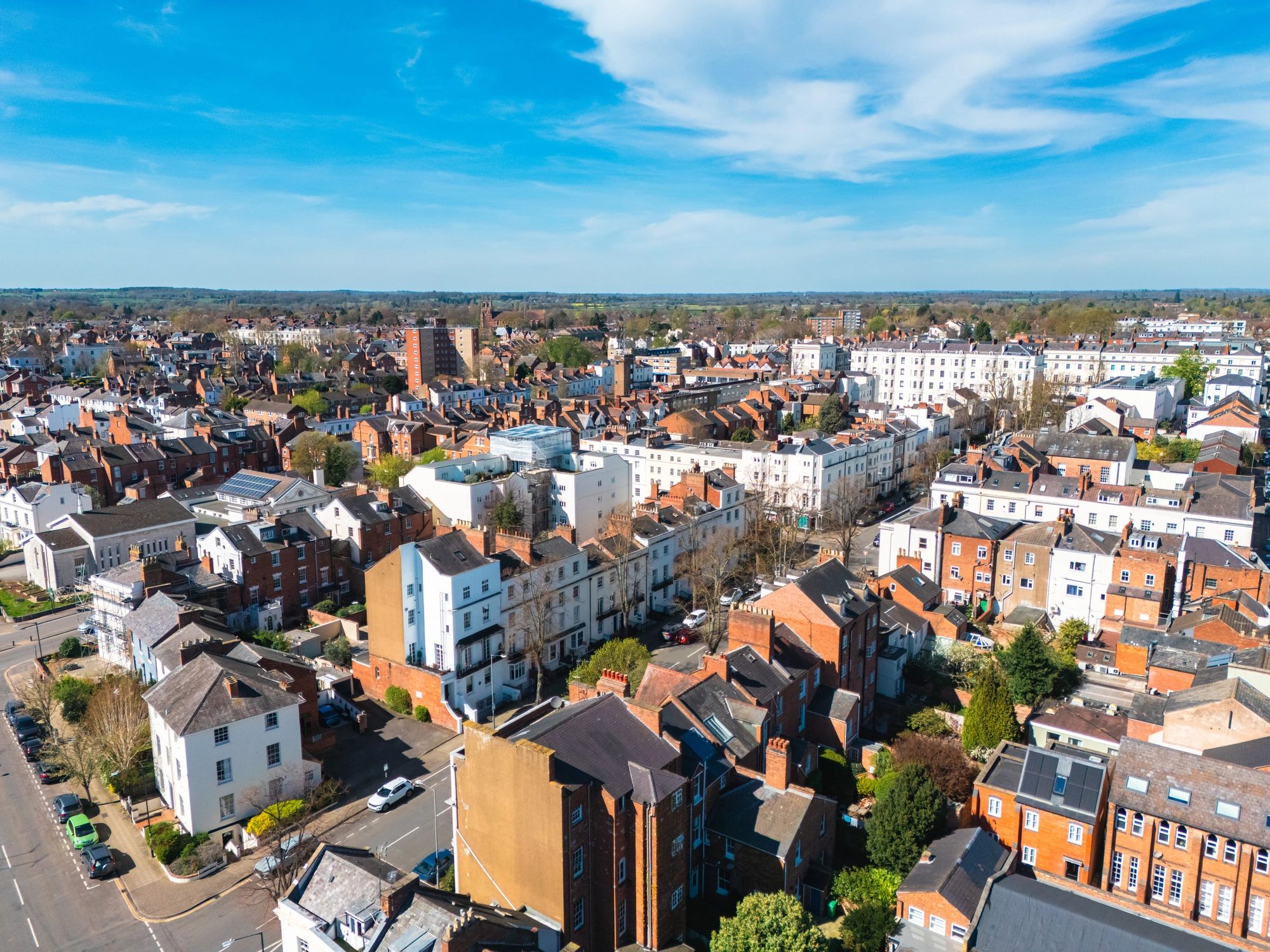 Aerial view of residential housing and neighborhood streets